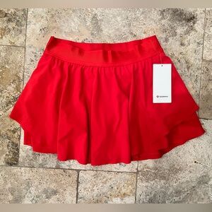 NWT Lulu Lemon red tennis and golf skirt. size 10